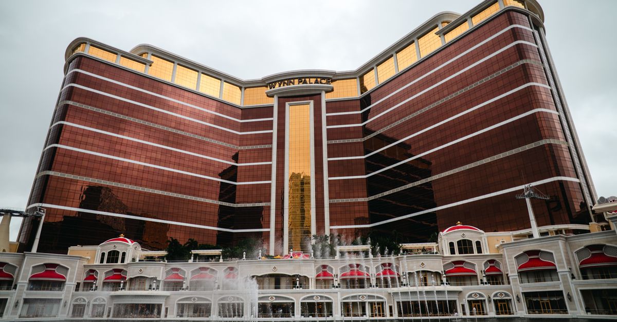 Front view of Wynn Palace Hotel, Macau with its distinctive modern architecture and elegant water fountains.